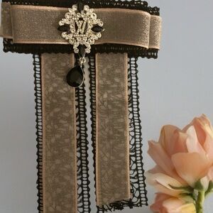 Upscaled Elegant Black and Gold LV Brooch with Crystal Accent